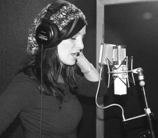 Chantal Kreviazuk recording vocals in the studio.