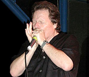 Delbert McClinton performing live.