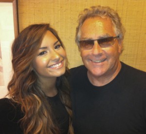 Jon Lind with Demi Lovato.