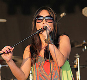 Malea McGuinness' "Time Will Show" Named October "Best Song Of The Month" 2 Malea McGuinness performing live.