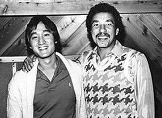 Dale Kawashima with Smokey Robinson.