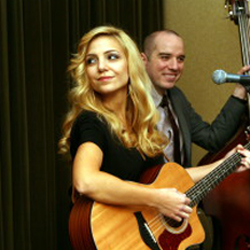 Abbie Folken's "Wildflower" Named December "Best Song Of The Month" 2 Abbie Folken performing live.