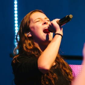 Savannah Stewart performing live.