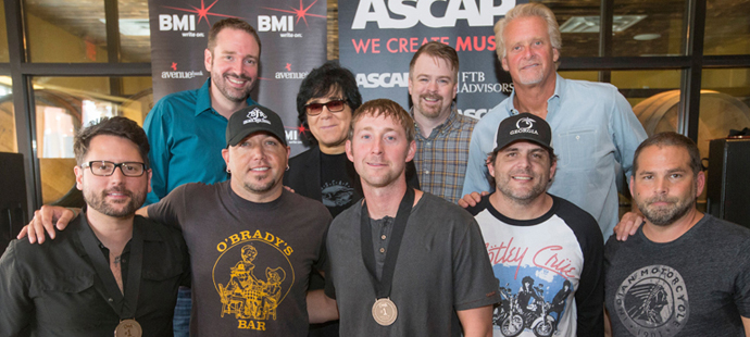 Pictured front row (l-r): Chris DeStefano, Jason Aldean, Ashley Gorley, Rhett Akins and Michael Knox (producer). Back row (l-r): Leslie Roberts (of BMI), Chris Farren (Combustion Music), John Titta (ASCAP) and Josh Van Valkenburg (Sony/ATV Music).