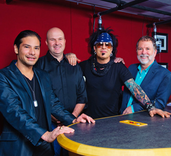 Nikki Sixx of Motley Crue signs with SESAC in 2015. Pictured (l-r): SESAC's Glen Phillips, Sam Kling, Nikki Sixx and SESAC's Dennis Lord 