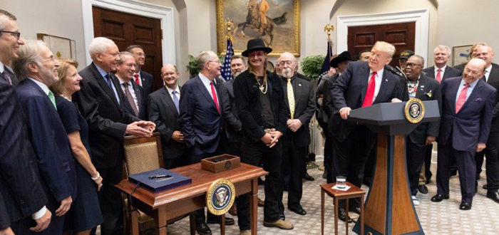 David Israelite, Neil Portnow, Donald Trump at the White House for the signing of the Music Modernization Act.