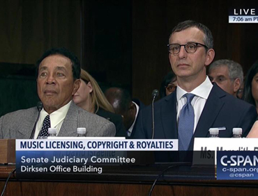 Smokey Robinson and David Israelite at a Senate Judiciary Committee hearing.