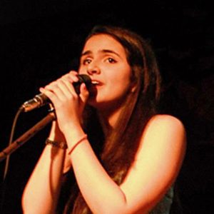 Leah Khambata performing live.