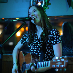 Emily Pyscher’s “Different Bar” Named September “Best Song Of The Month” 2 Emily Pyscher performing live.